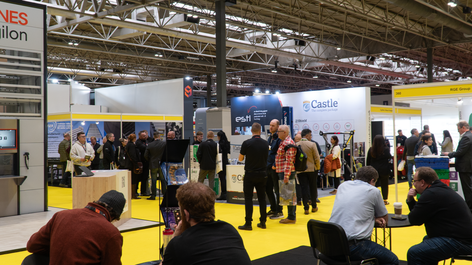 Attendees at Intralogistix 2024 event surround the Castle Industrial stand.